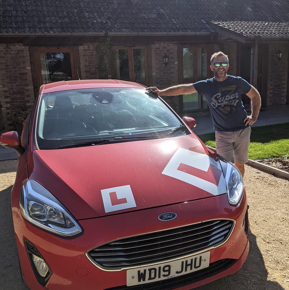 Marc Gerolimatos - driving instructor and his car